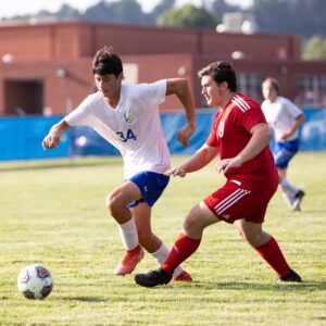 Caelan playing soccer