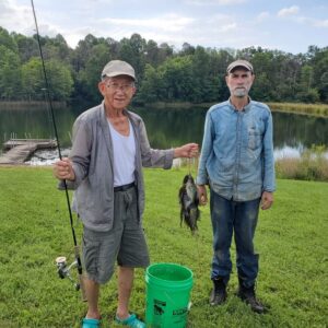 Father Lee and I fishing